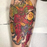 Explore our neo-traditional Japanese tattoo by Tiny, blending traditional Japanese elements with vibrant colors at The Wolves Den. Neo-traditional Japanese tattoo by Tiny at The Wolves Den Pakenham.