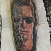 Explore our realistic Terminator tattoo by Tiny, showcasing intricate detail and dedication to sci-fi artistry at The Wolves Den. Realistic Terminator tattoo by Tiny at The Wolves Den Pakenham.